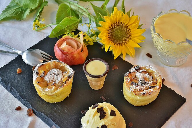 Food Tasting Tour in Hidden Gems of Vienna for Small Groups - Stop 2: Neubaugasse 1 and the rum-and-jam pink-iced punschkrapfen