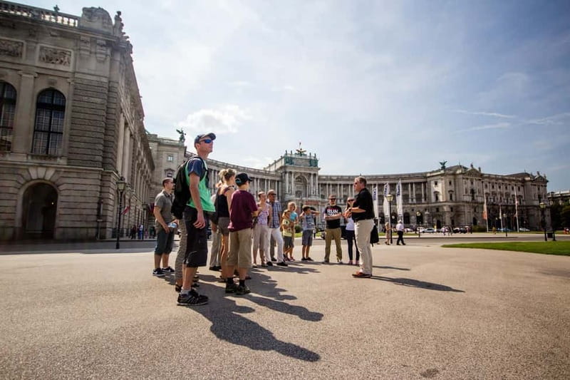 Vienna: 2 Hours Sightseeing Walking Tour - Getting Oriented at Michaelerplatz Outside Loos Haus