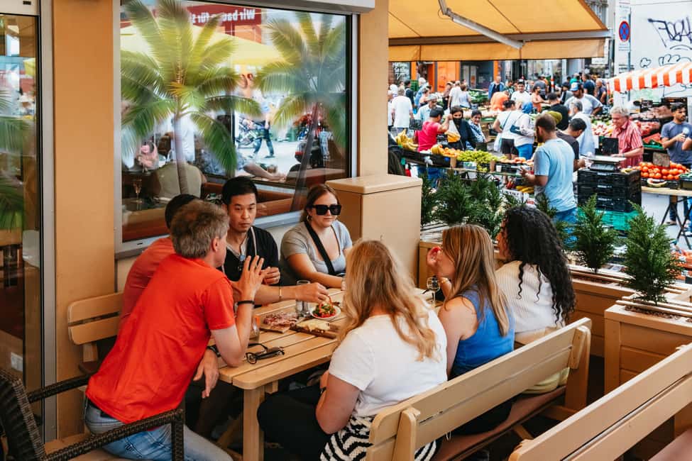Vienna: Guided Foodie Walking Tour with Tastings and Coffee - Naschmarkt and street food: sausages, Wurstelstand snacks, and sweet finishes