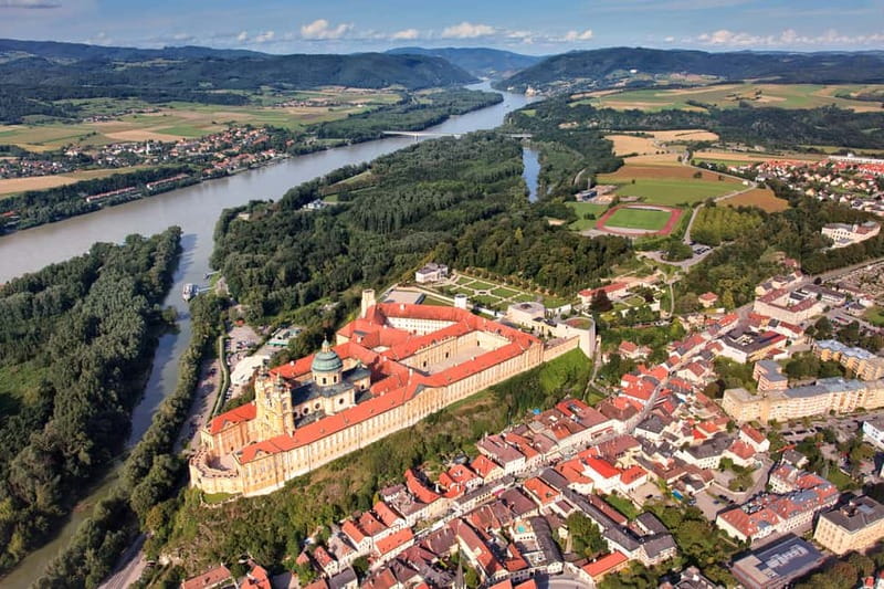Vienna: Hallstatt, Salzburg, Melk, Alps & Lakes Day Trip - Salzburg for Sound of Music Nostalgia and Real Old Town Strolling