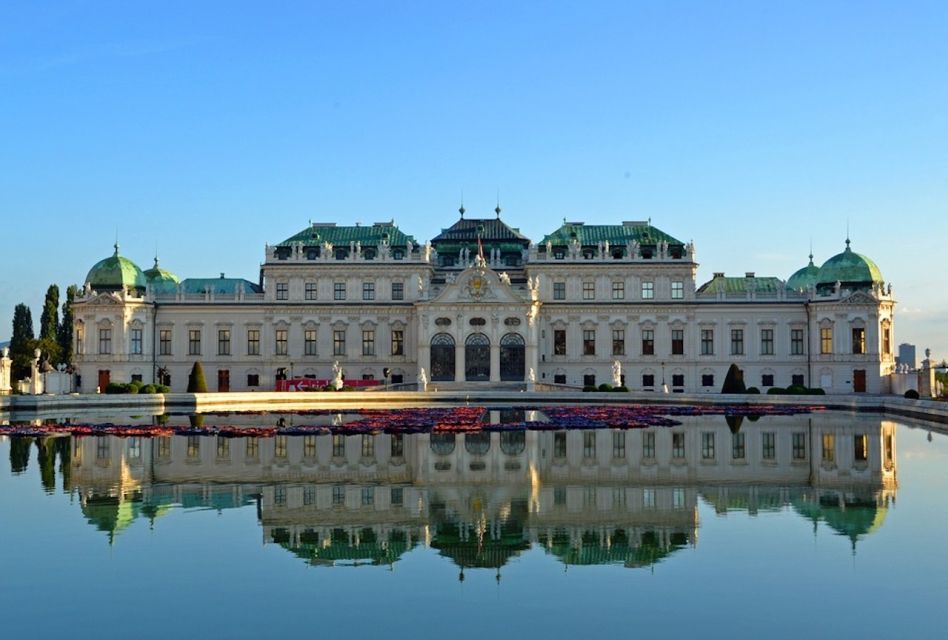 Vienna: Sightseeing Tour in a 1920s Classic Style Car - Around the Hofburg: statues, theaters, libraries, and the power of seeing it in sequence